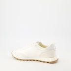 Immagine delle sneakers bianche New Rush di AMI PARIS per unisex - Stagione Primavera-Estate 2025 - Vista posteriore destra in tre quarti