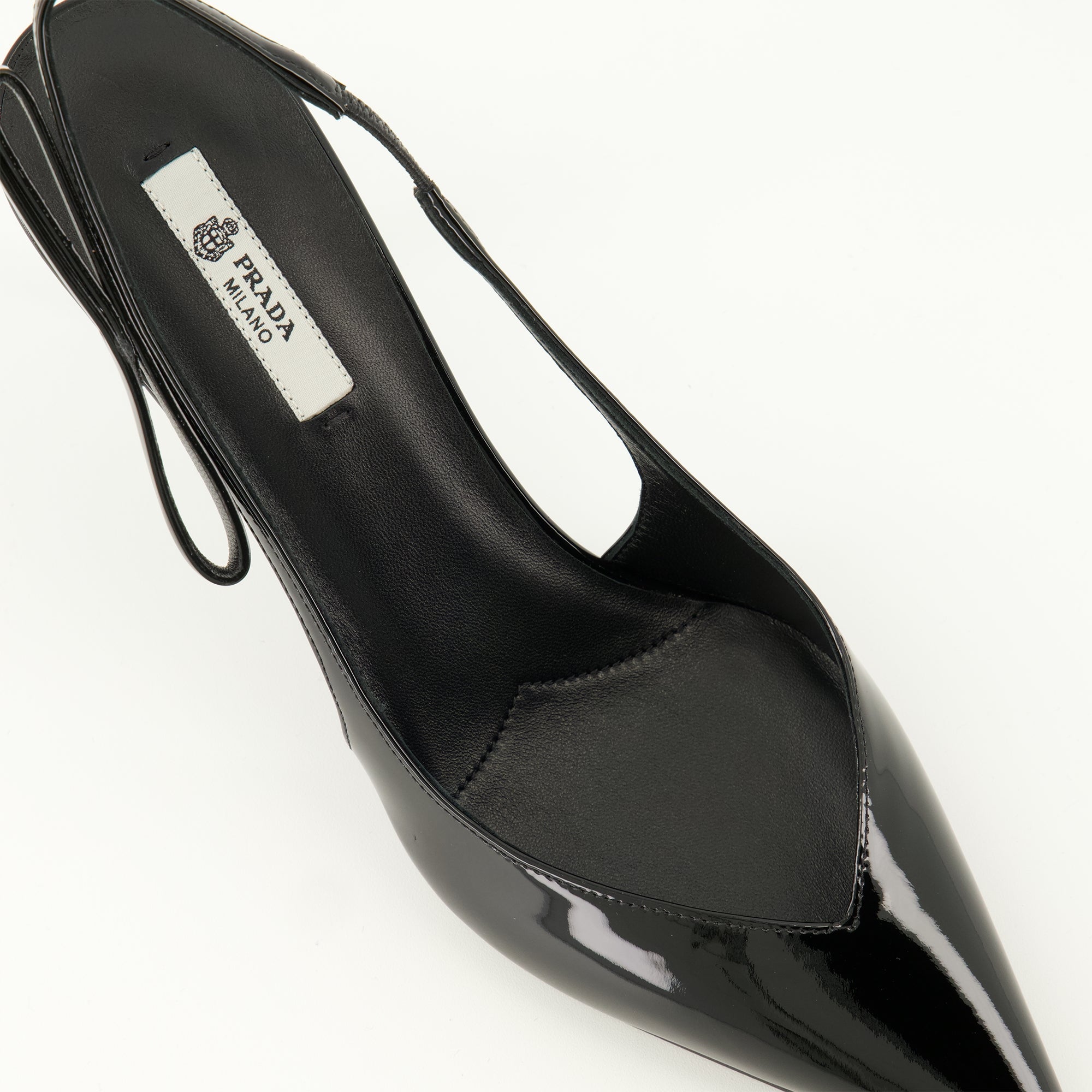 Image of Patent Black Pumps by Prada for Women - Season Spring-Summer 2026 - Top Detail View