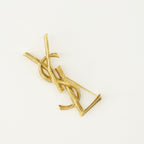Saint Laurent brooch, Cassandre serpent accessory, metallic gold pin, luxury accessories, high-end jewelry