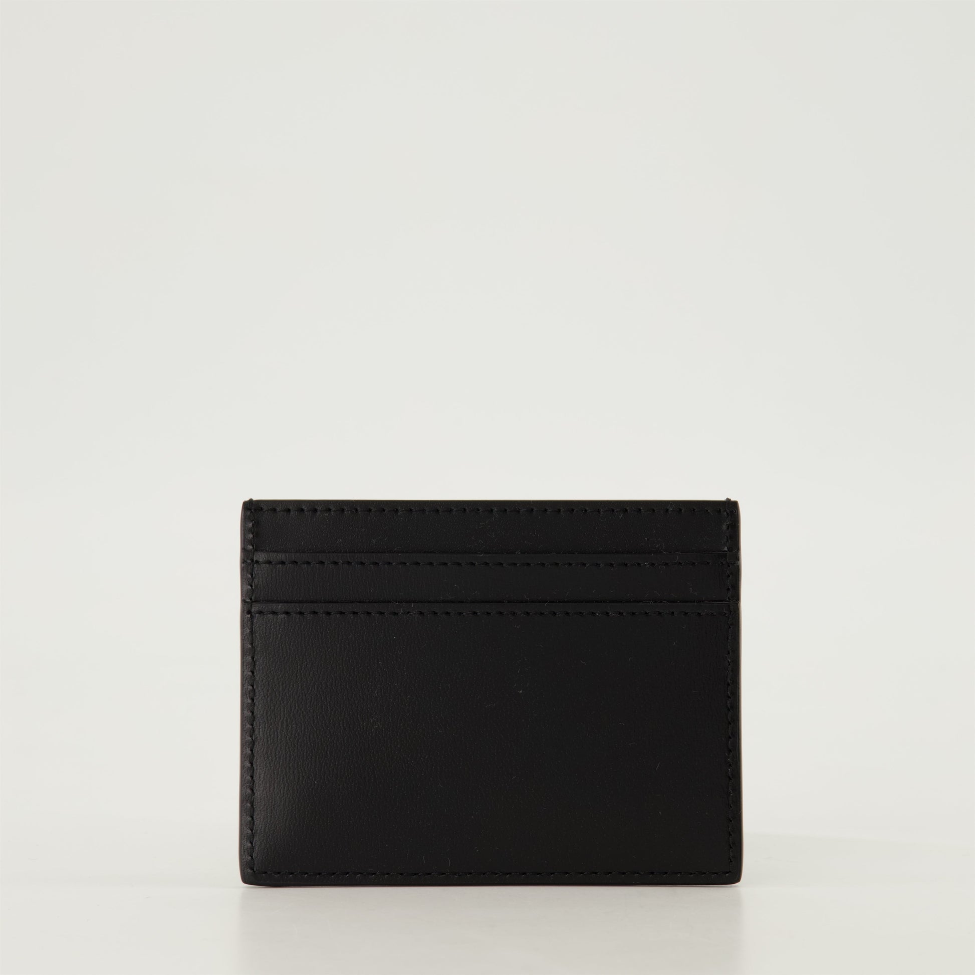 leather card holder, Saint Laurent, card holder black, metallic logo card holder, sophisticated accessory