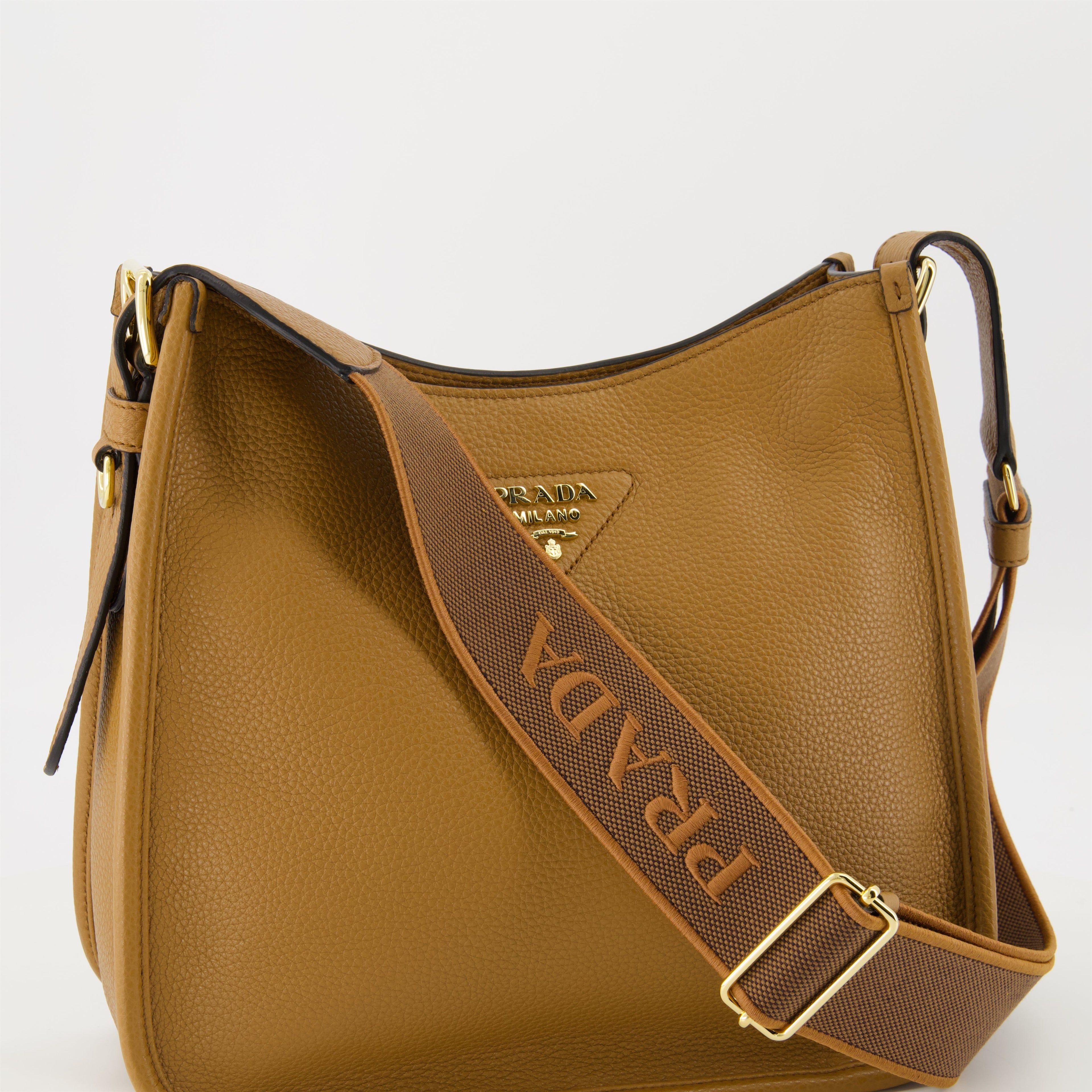 Prada hobo bag, camel leather bag, designer handbag, spring-summer collection, practical luxury accessories
