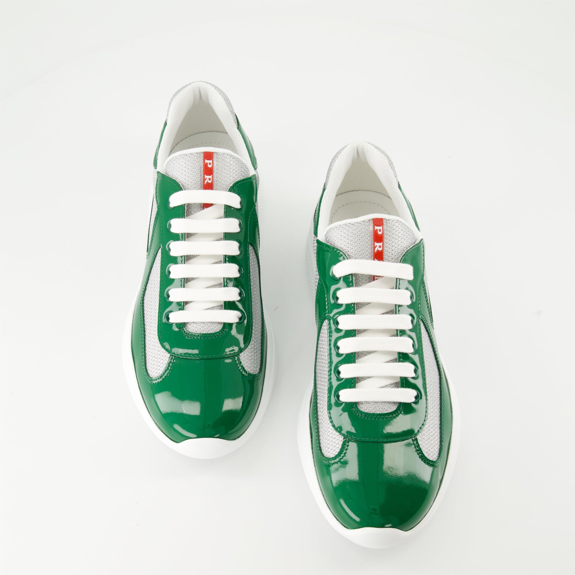 Prada sneakers, patent leather shoes, bicolor design sneakers, luxury men's footwear, Autumn-Winter 2024 collection