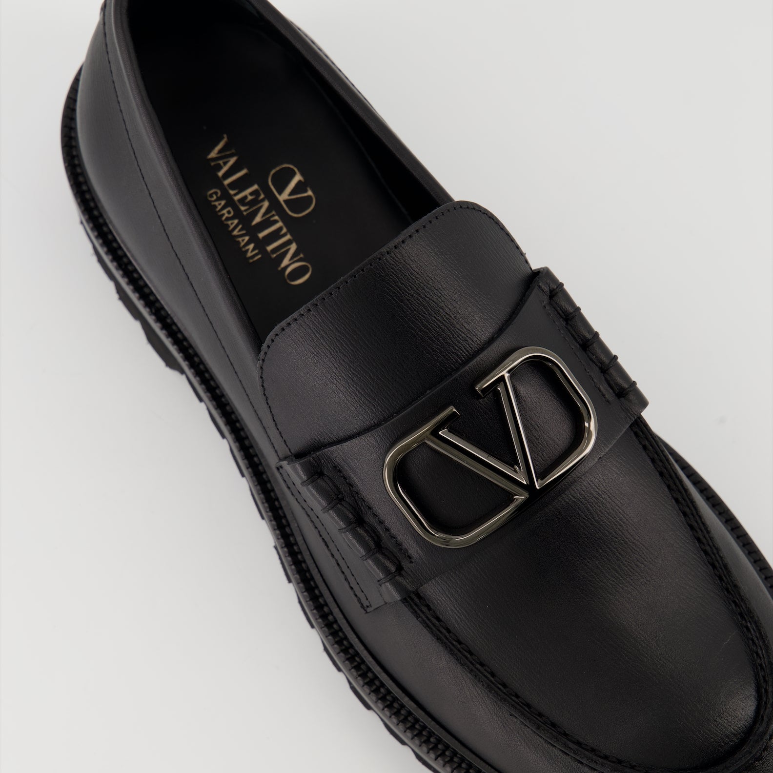 luxury moccasins, black leather moccasins, Valentino Garavani footwear, designer moccasins, Autumn-Winter 2024