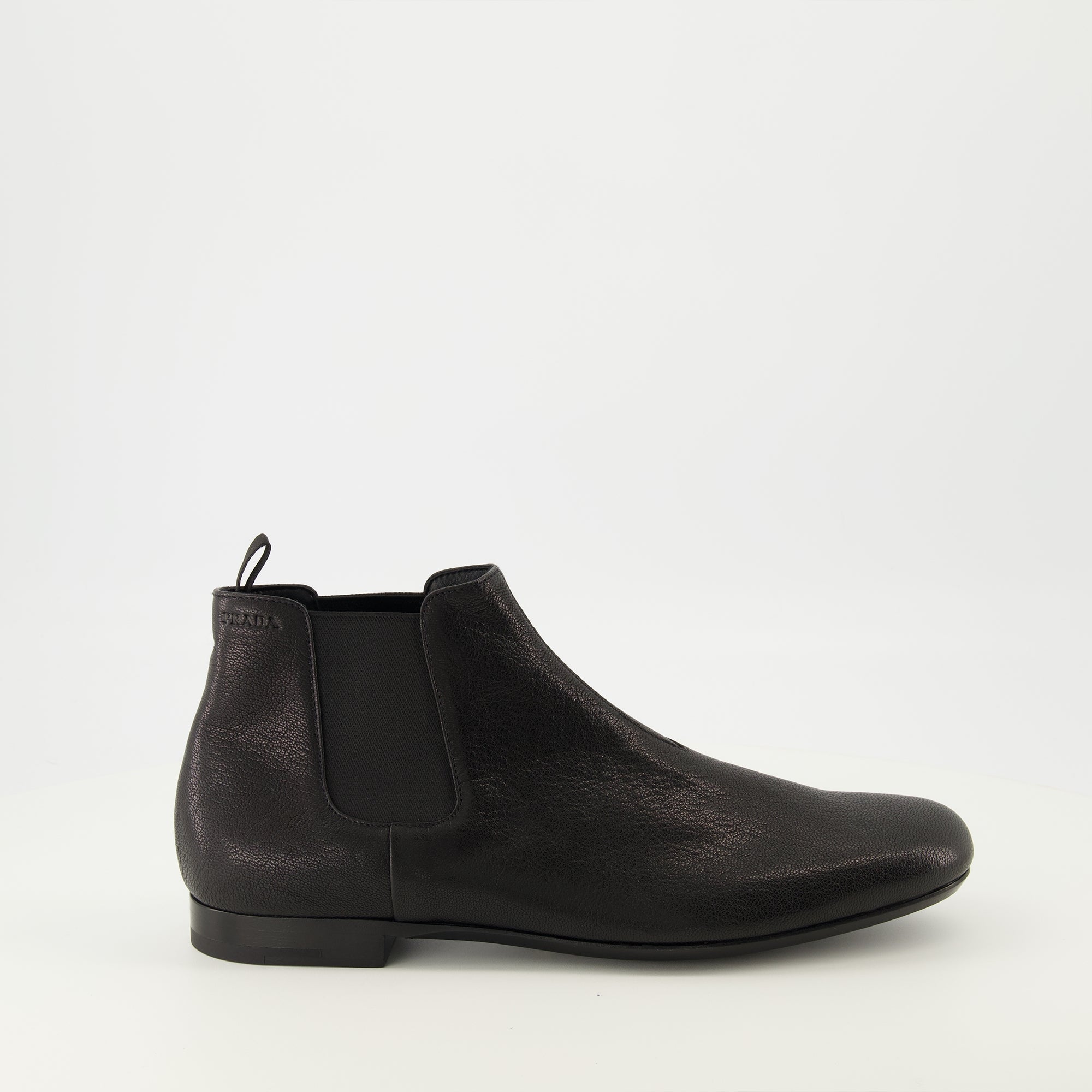 Chelsea boots, black leather boots, Prada footwear, men's boots, grained leather