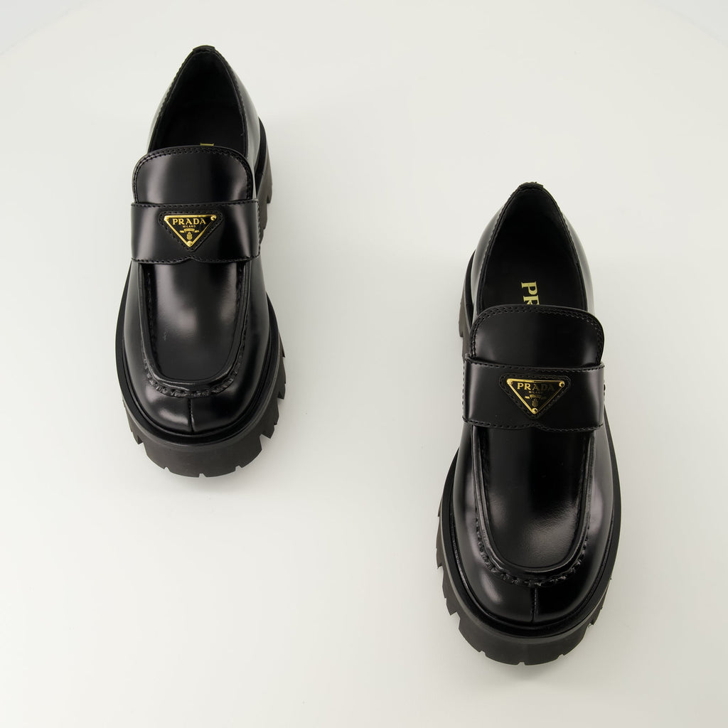 Prada moccasins, black leather shoes, slip-on footwear, rounded toe moccasins, Autumn-Winter collection