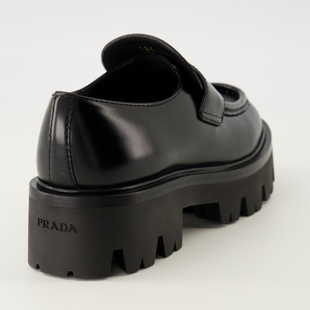 Prada moccasins, black leather shoes, slip-on footwear, rounded toe moccasins, Autumn-Winter collection