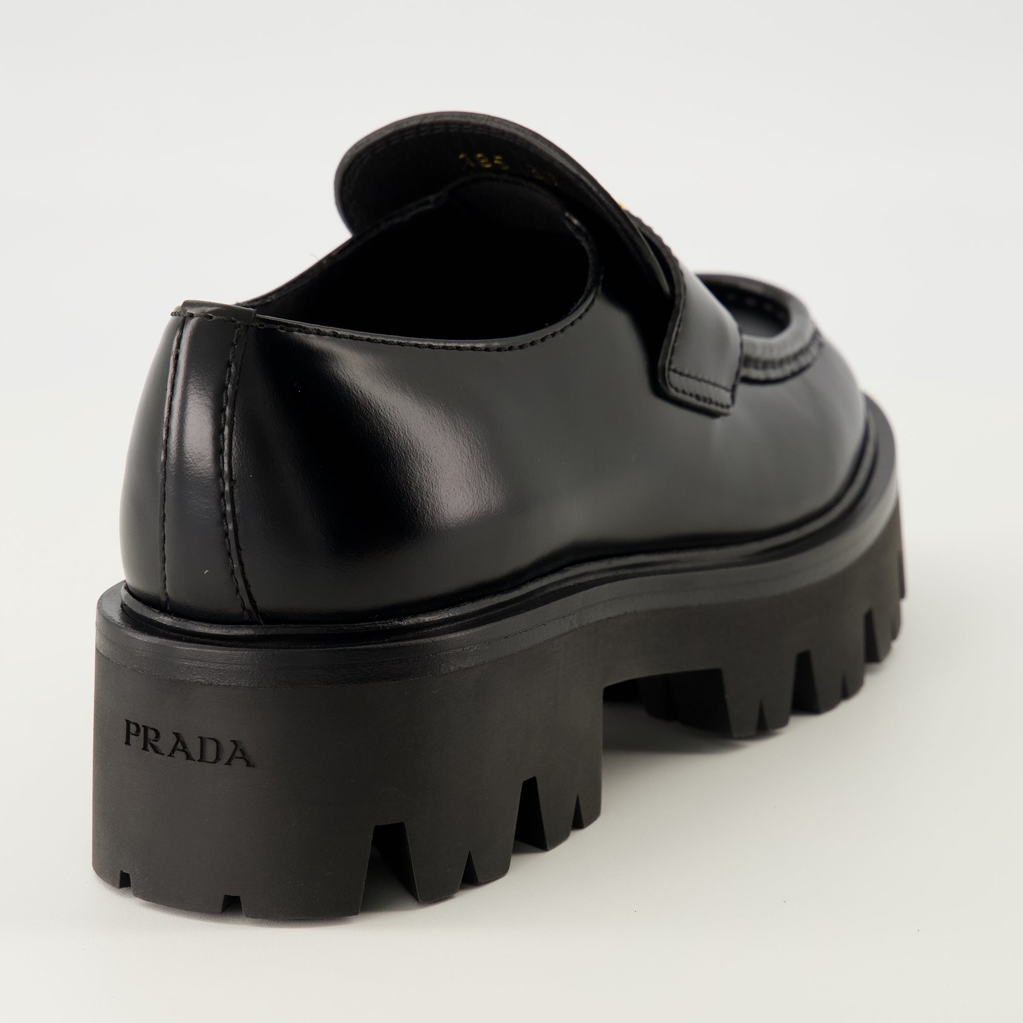 Prada moccasins, black leather shoes, slip-on footwear, rounded toe moccasins, Autumn-Winter collection