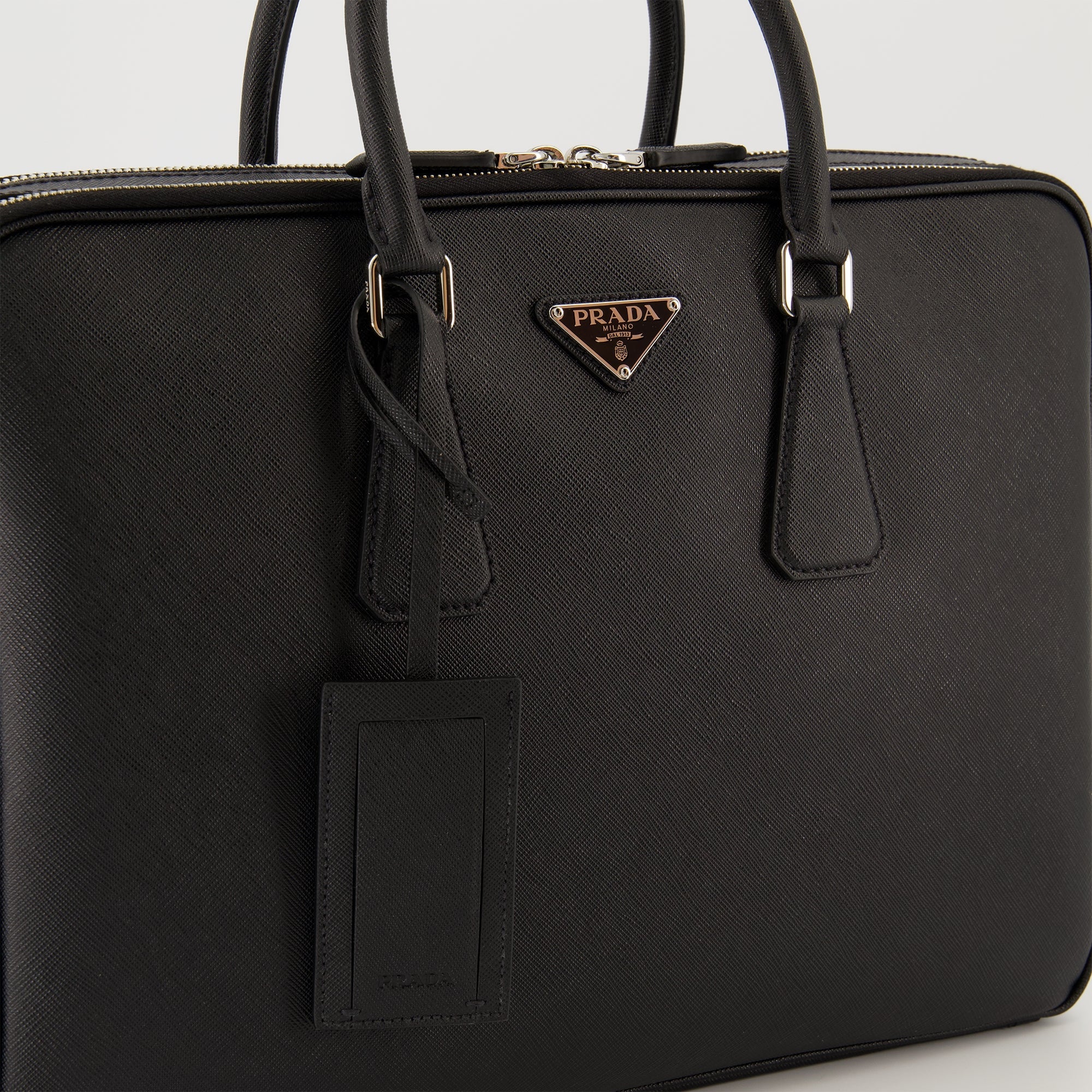 Prada briefcase, Saffiano leather bag, black leather briefcase, luxury leather accessories, designer briefcase