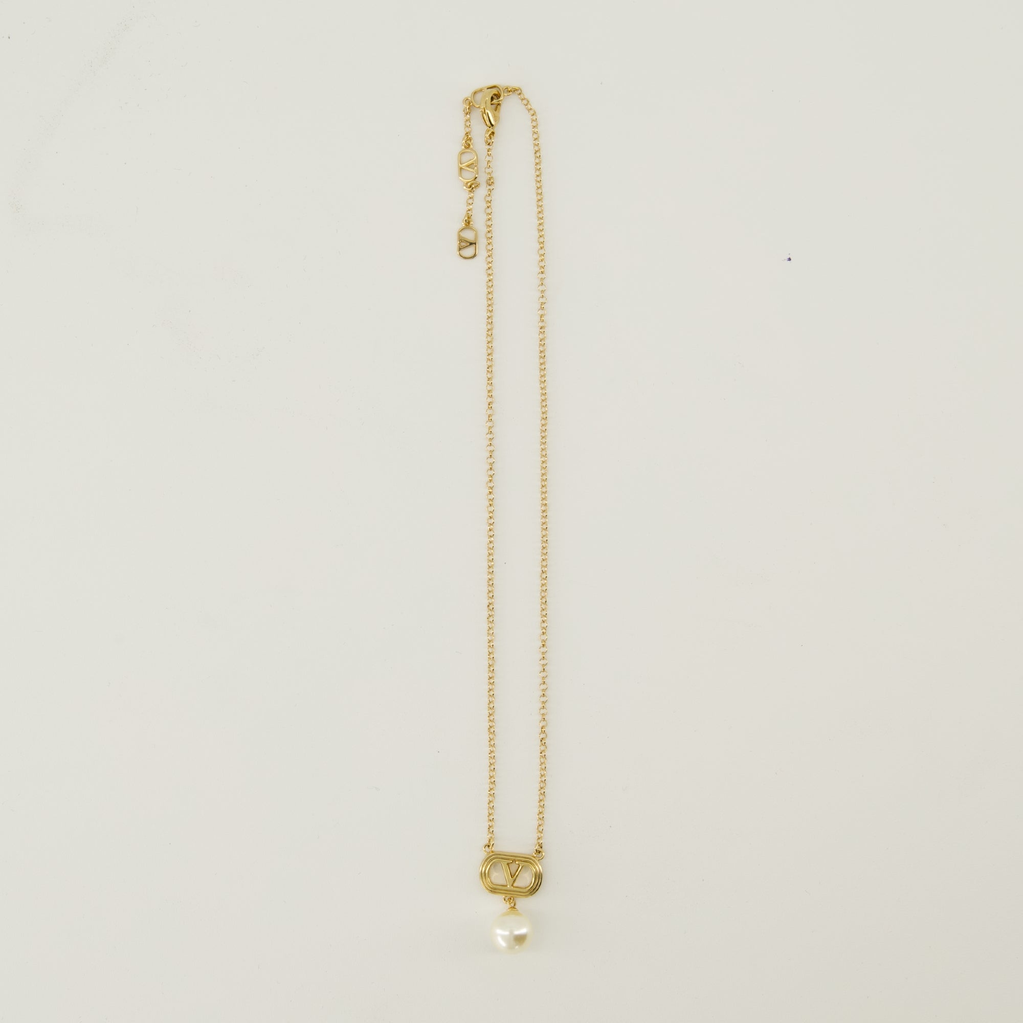 Valentino Garavani necklace, Vlogo pearl necklace, luxury accessories, gold metal jewelry, designer neckwear