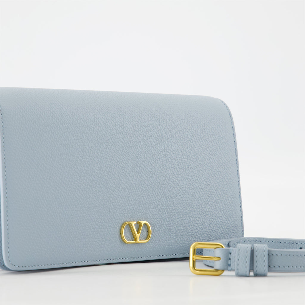 VLogo pouch, Valentino Garavani, leather accessory, spring-summer collection, blue handbag