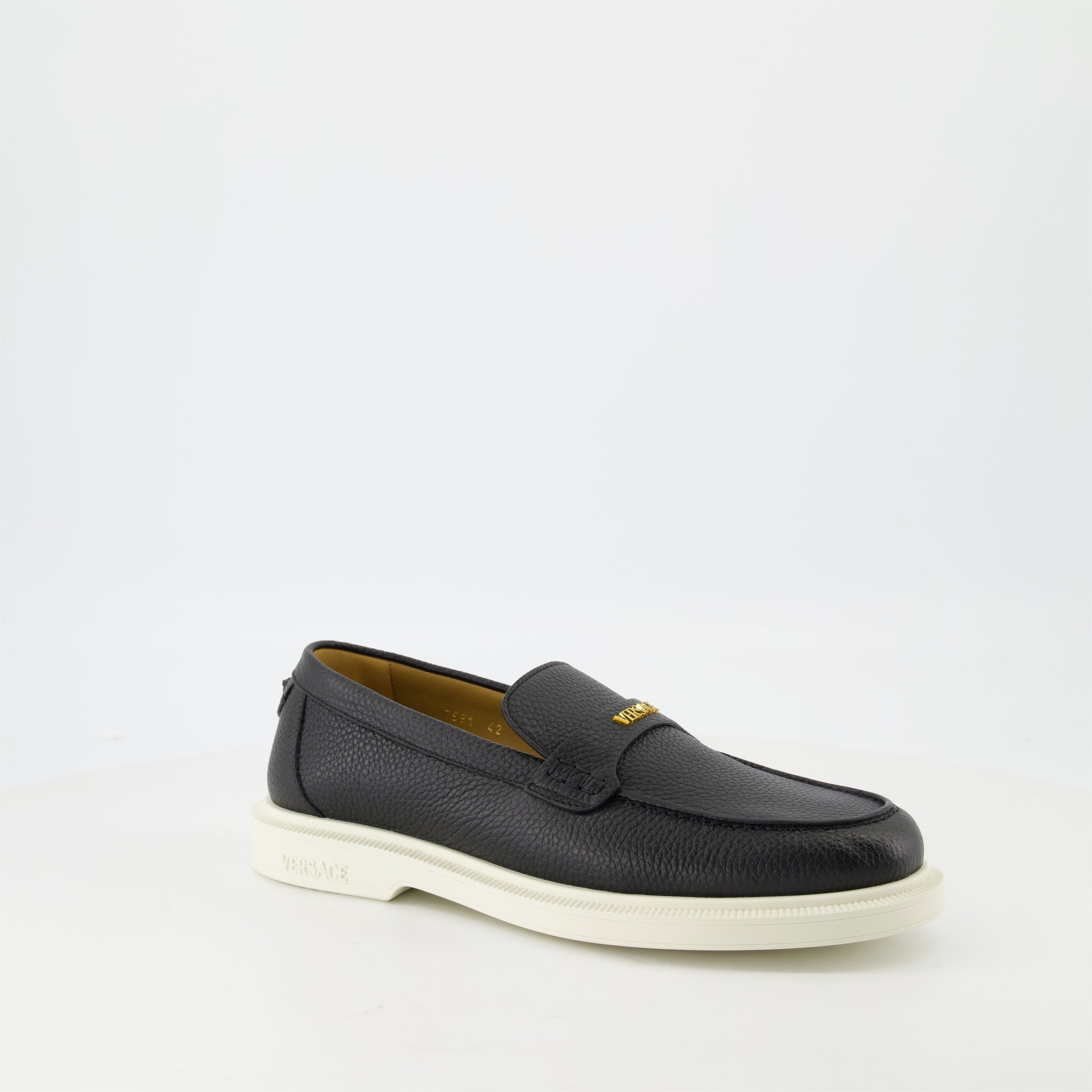 black leather moccasins, grained leather shoes, slip-on footwear, Versace design, Medusa emblem shoes