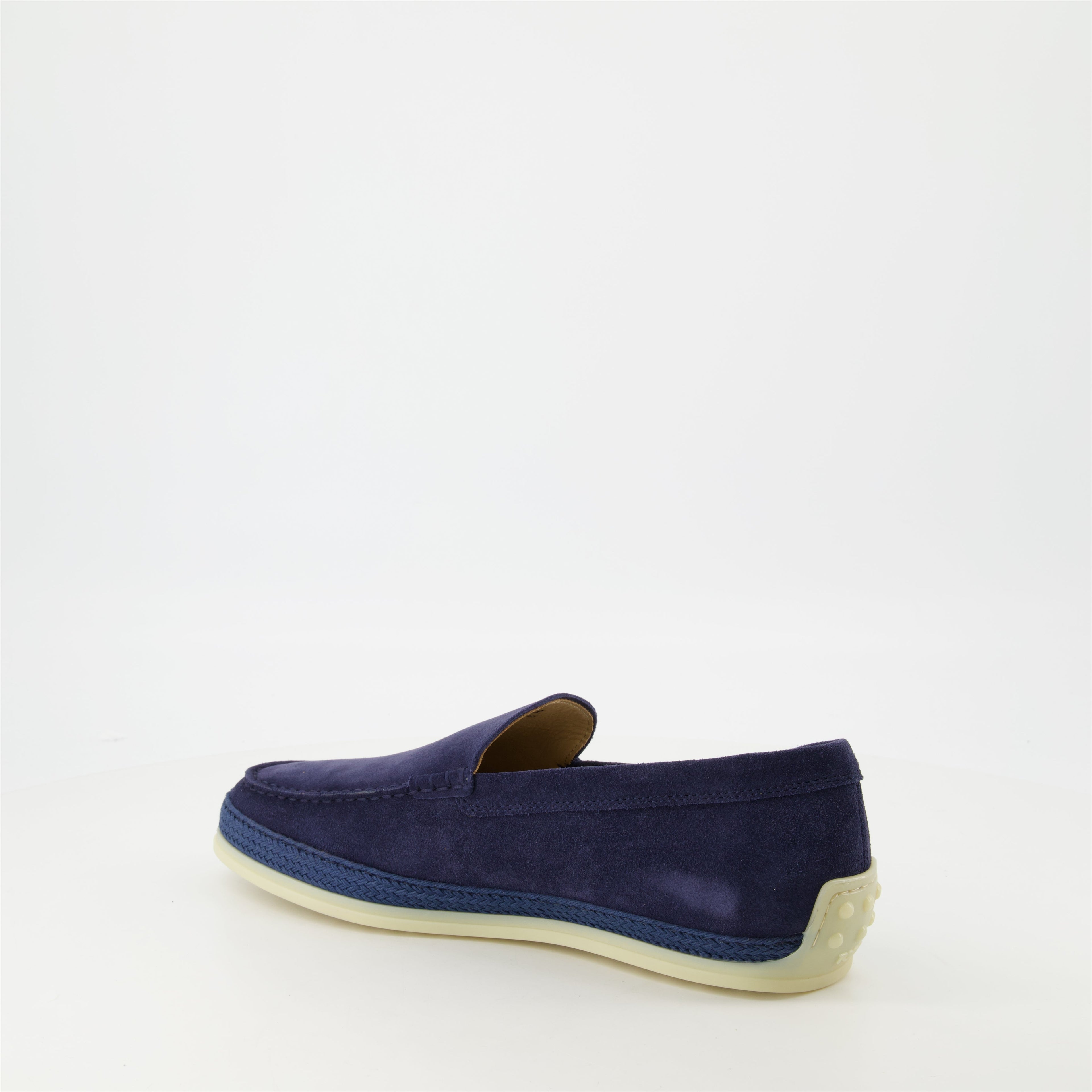 blue suede moccasins, slip-on shoes, gum sole, artisanal detail, contemporary footwear