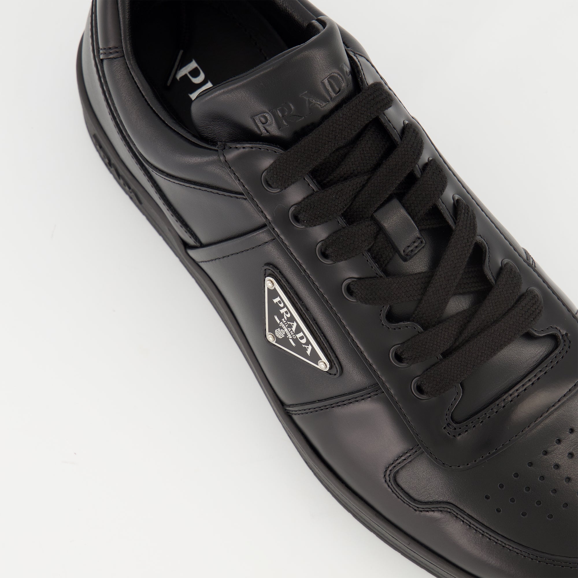 Prada baskets, black leather sneakers, luxury footwear, Autumn-Winter collection, designer shoes