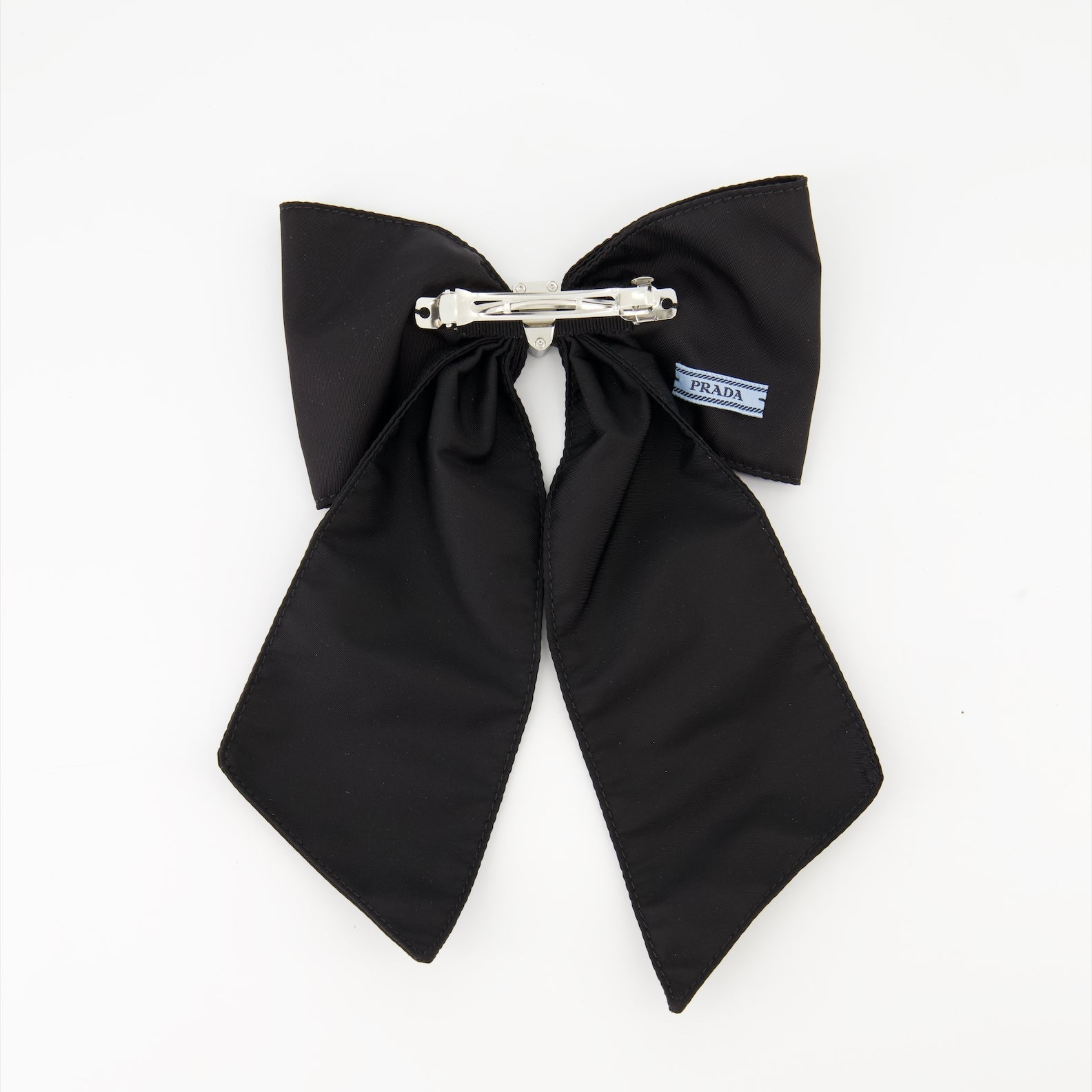 Luxury hair accessories, Prada Re-Nylon, Spring-Summer 2024, sustainable fashion, black hair bow