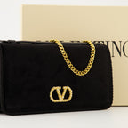 Valentino pouch, black velvet accessory, Autumn-Winter collection, VLogo Signature, detachable chain strap