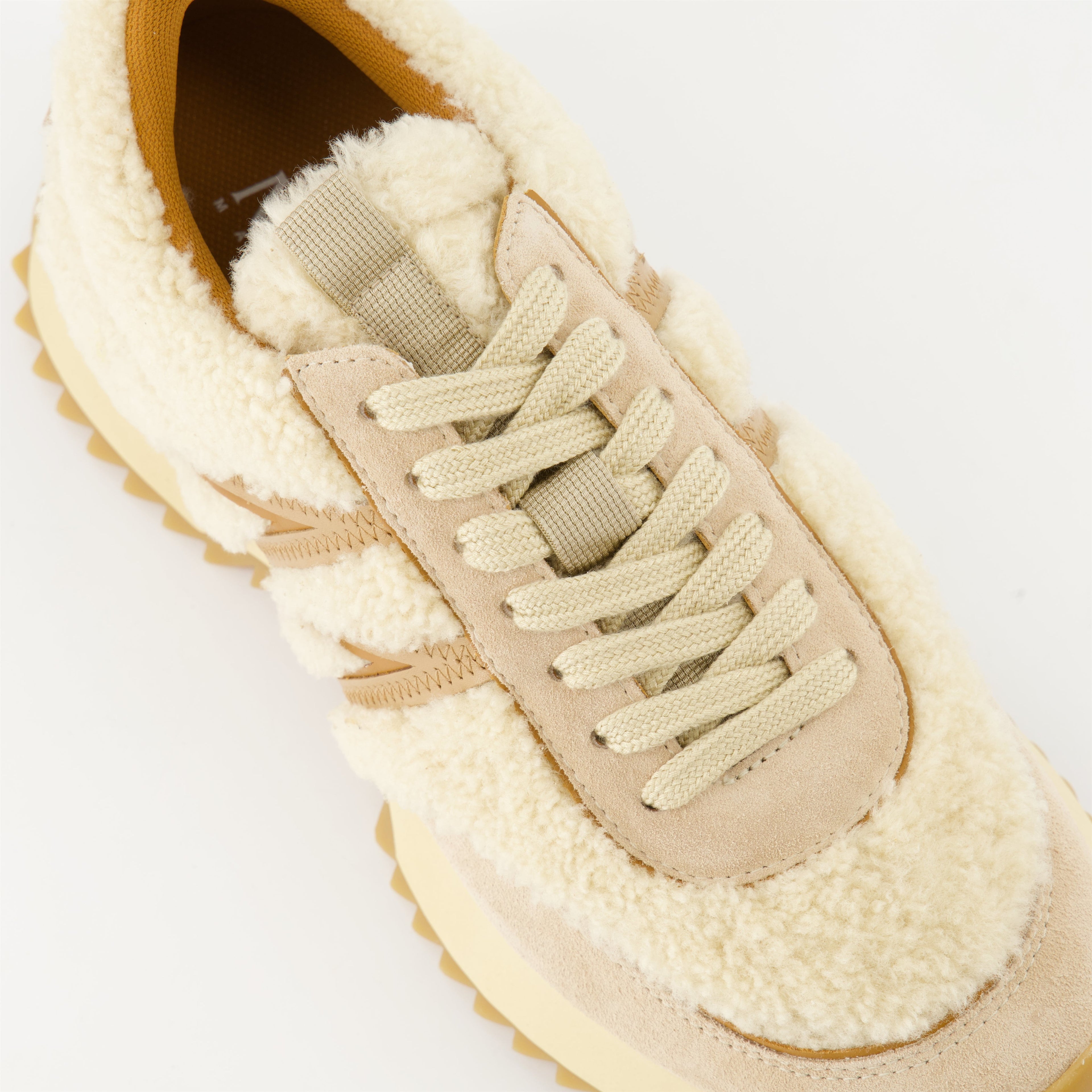 - Shearling sneakers- Moncler AW 2024- Luxury footwear- Beige suede sneakers- High-end casual shoes
