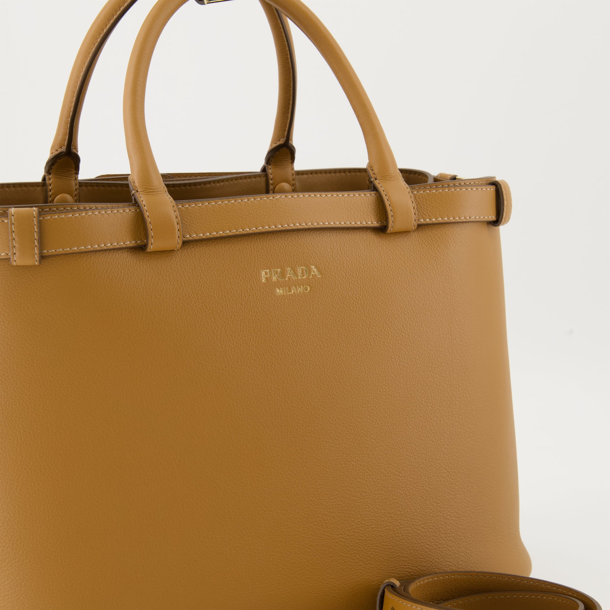 Prada buckle bag, luxury leather bag, nappa leather accessory, designer handbag, brown leather bag