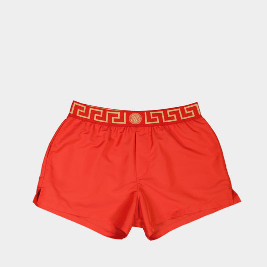 Versace swim shorts, Medusa Greca emblem, men's swimwear, red swim shorts, luxury beachwear