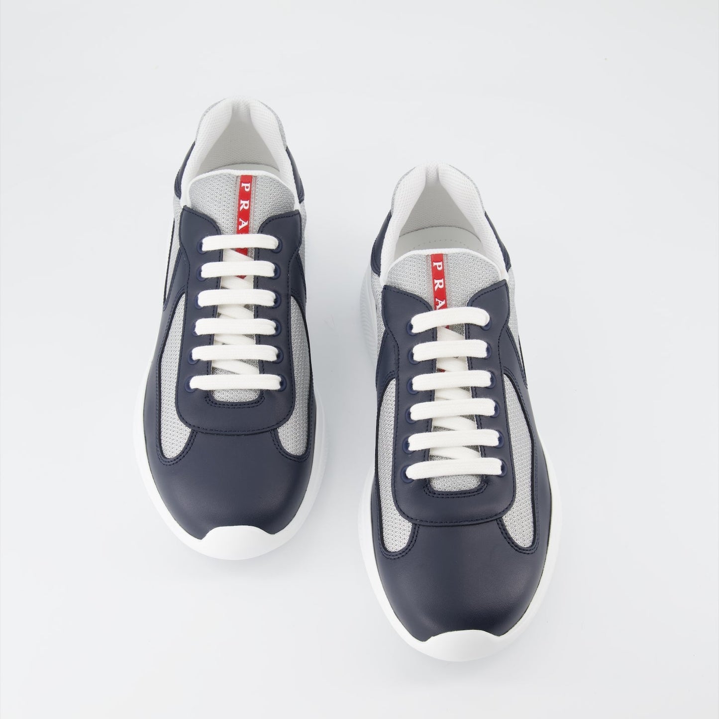 Prada sneakers, men's luxury footwear, America's Cup sneakers, blue-grey sneakers, high-end fashion sneakers