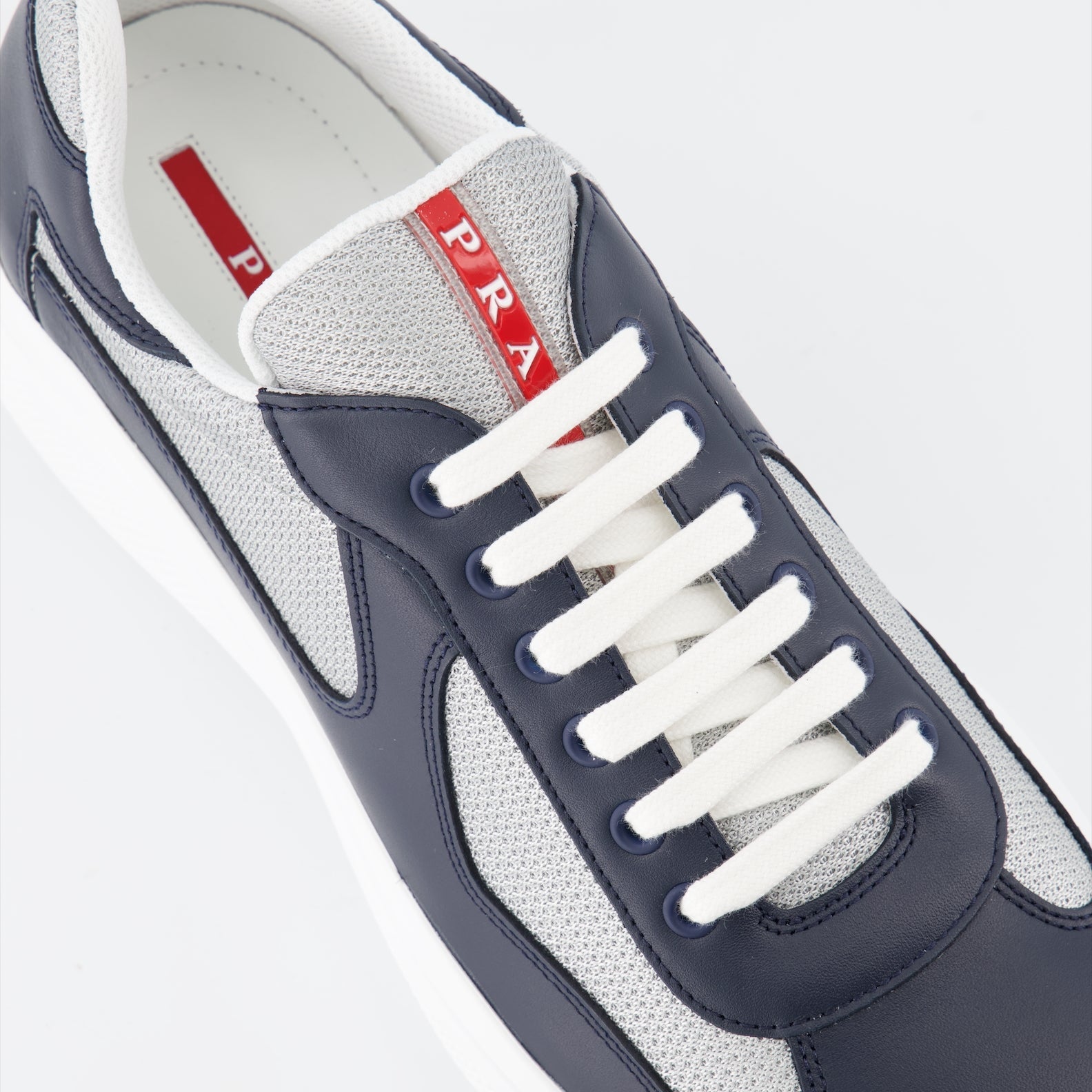 Prada sneakers, men's luxury footwear, America's Cup sneakers, blue-grey sneakers, high-end fashion sneakers