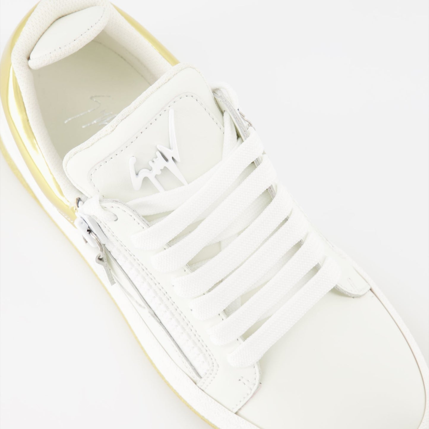 Giuseppe Zanotti sneakers, luxury women’s shoes, white-gold sneakers, high-end fashion, designer footwear