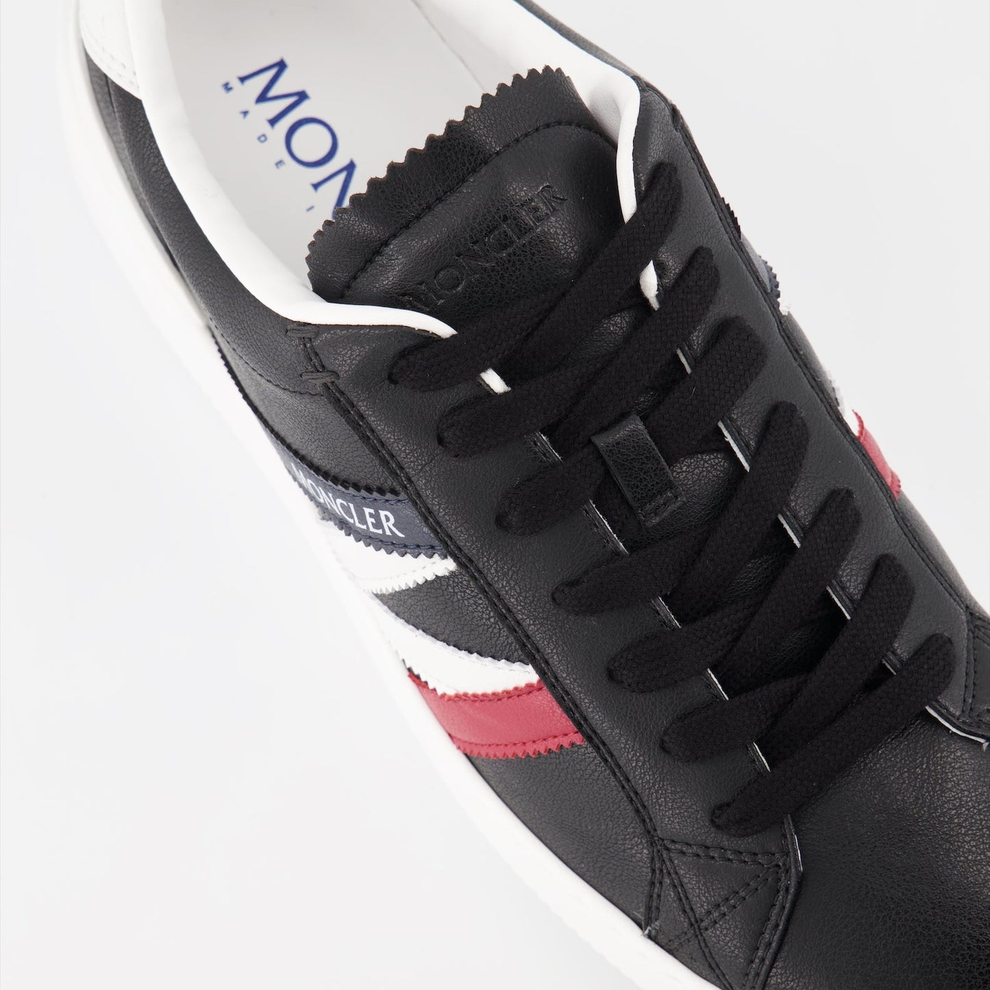 Moncler sneakers, black leather sneakers, luxury men's footwear, designer sneakers, Moncler Monaco