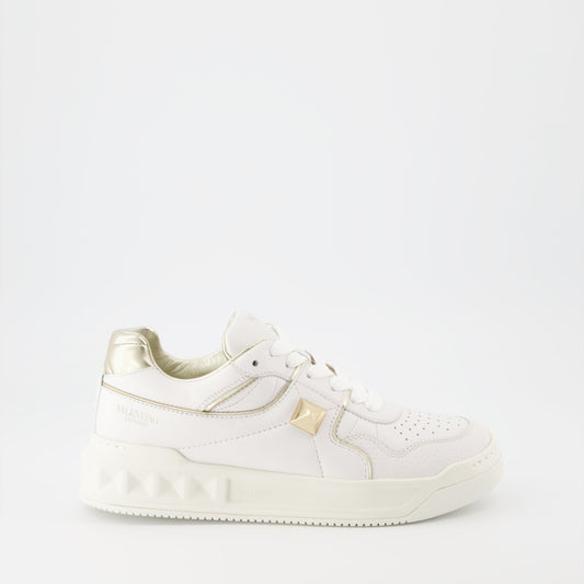 Valentino Garavani, women’s luxury sneakers, white and gold sneakers, One Stud sneakers, designer footwear