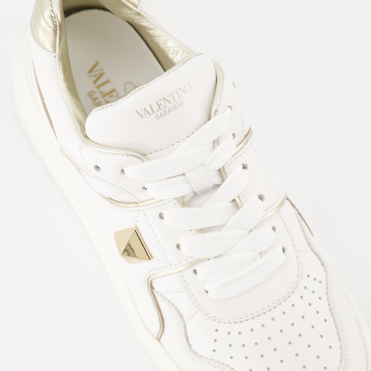 Valentino Garavani, women’s luxury sneakers, white and gold sneakers, One Stud sneakers, designer footwear