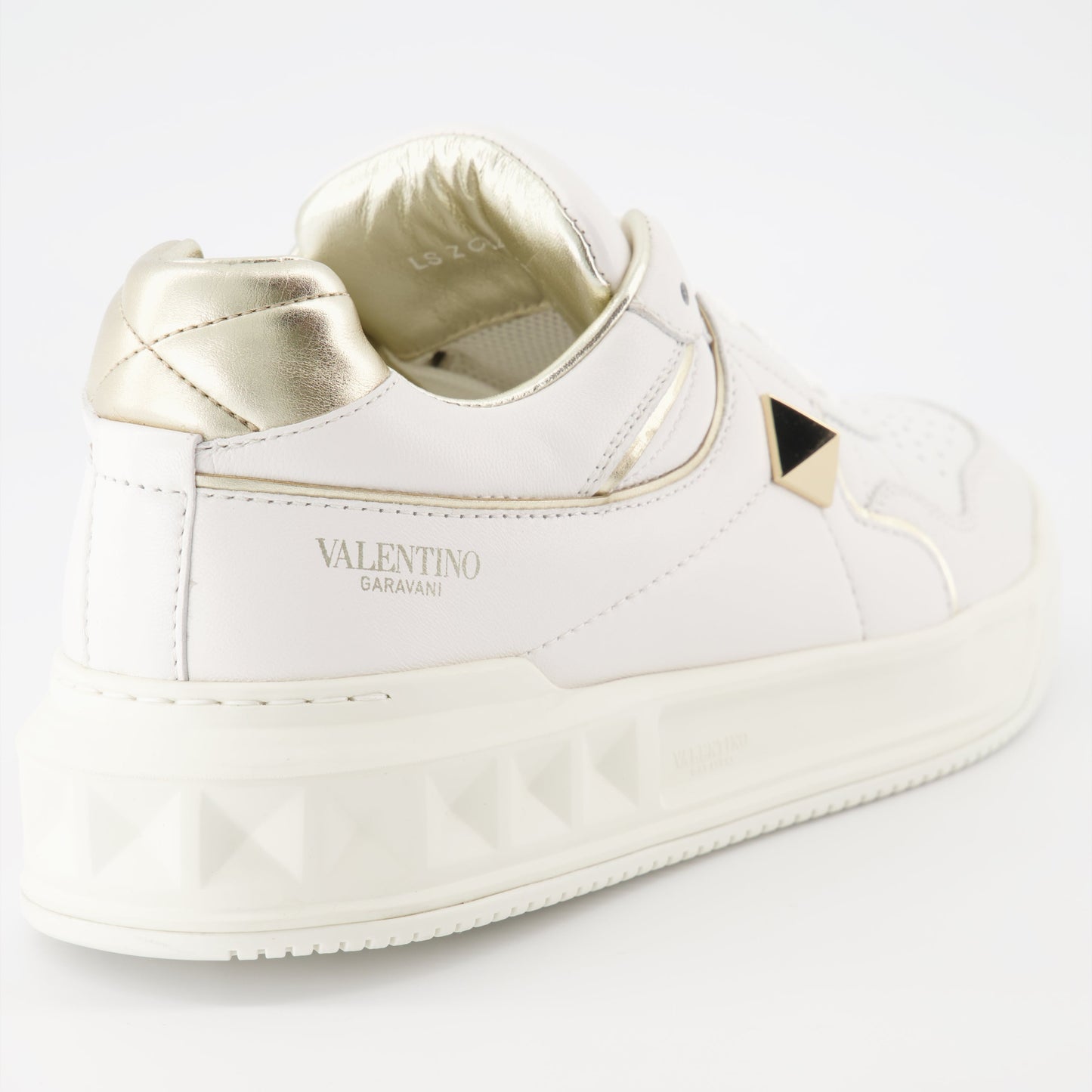 Valentino Garavani, women’s luxury sneakers, white and gold sneakers, One Stud sneakers, designer footwear