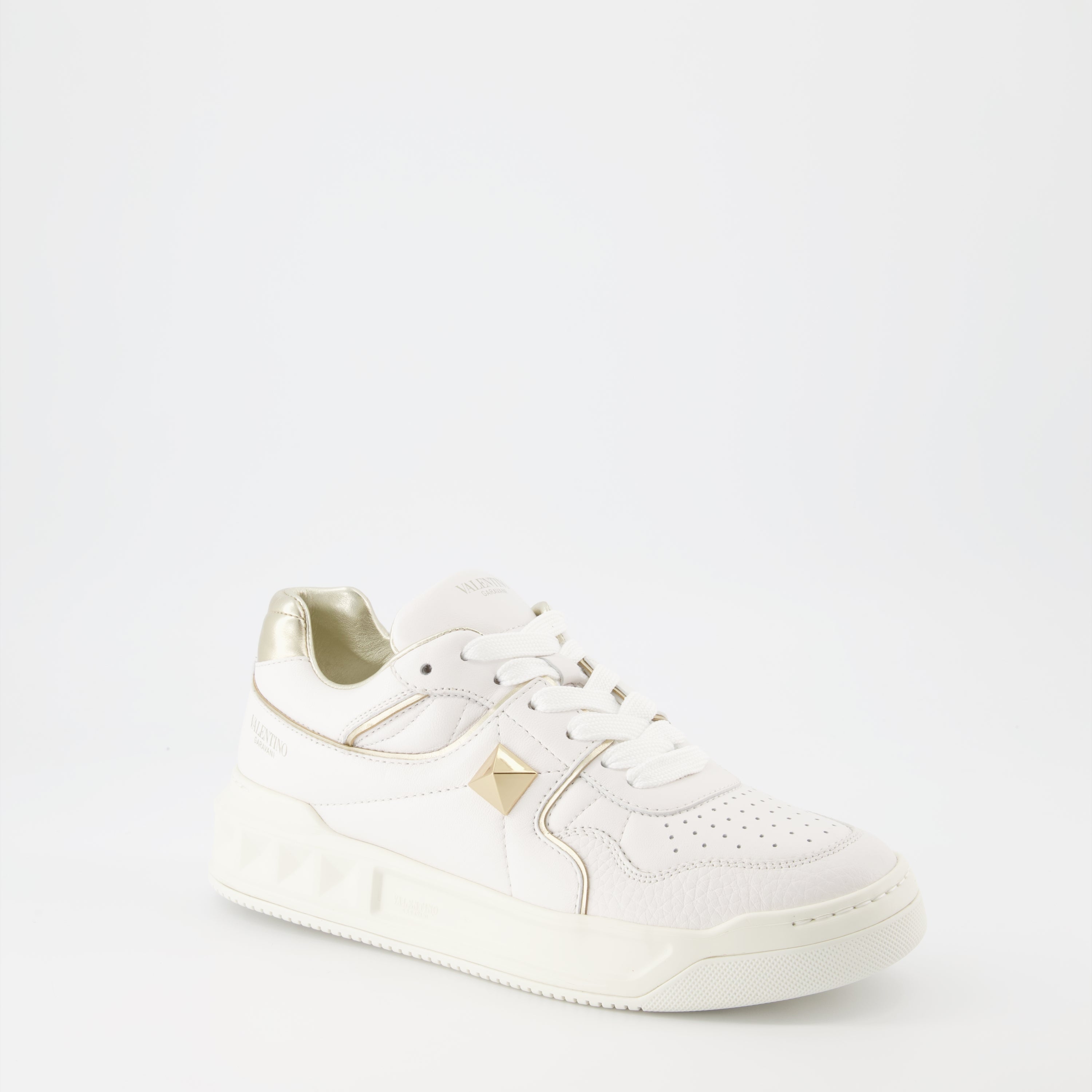 Valentino Garavani, women’s luxury sneakers, white and gold sneakers, One Stud sneakers, designer footwear