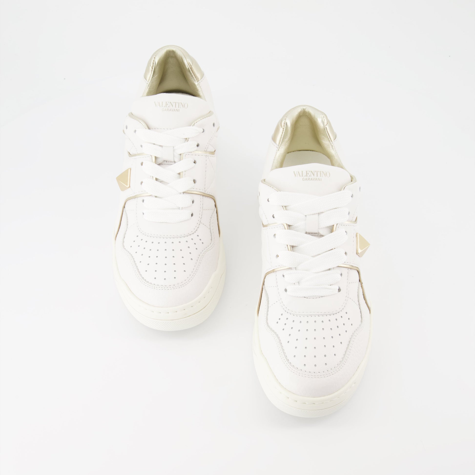 Valentino Garavani, women’s luxury sneakers, white and gold sneakers, One Stud sneakers, designer footwear