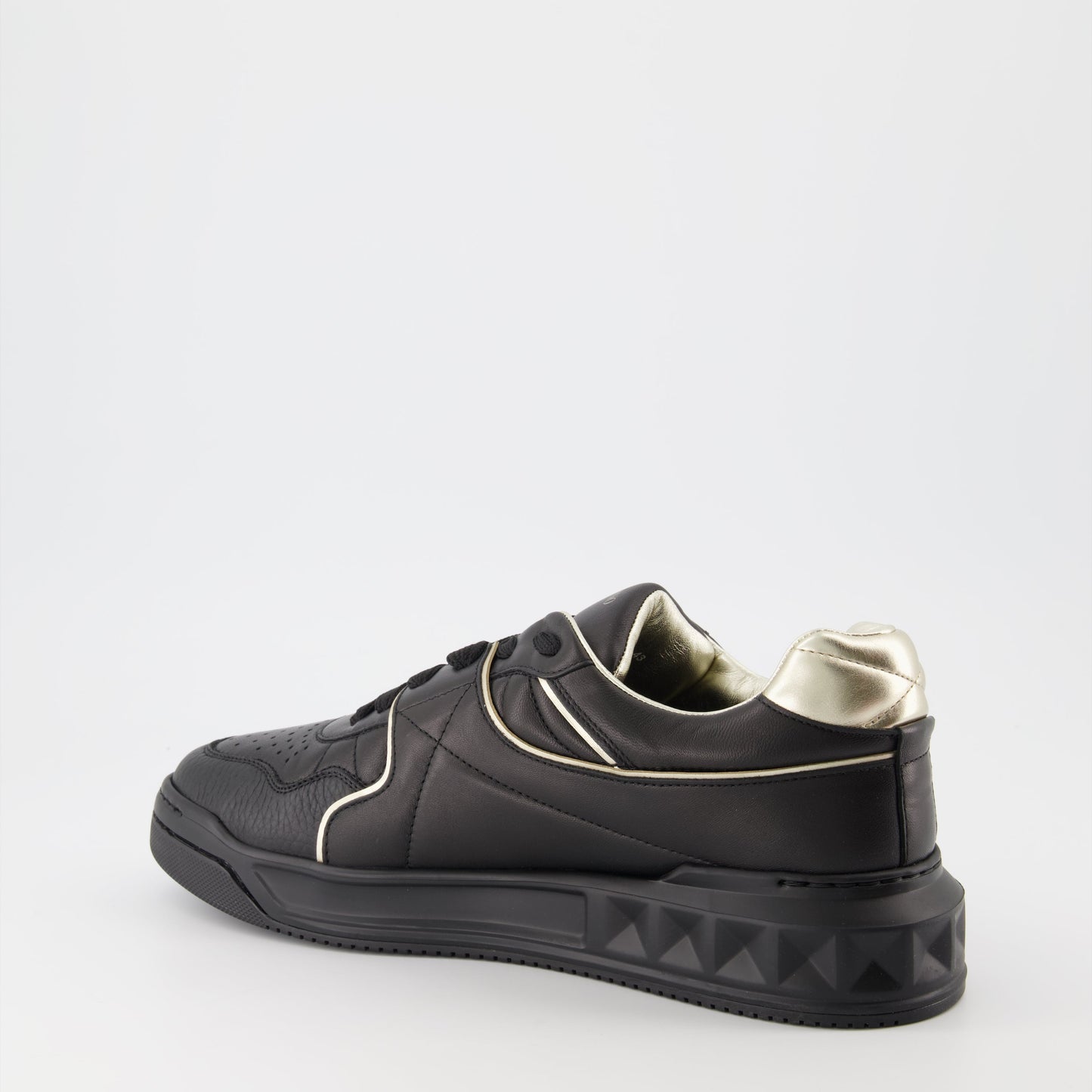 Valentino Garavani, luxury sneakers, men's fashion, designer footwear, black and gold sneakers