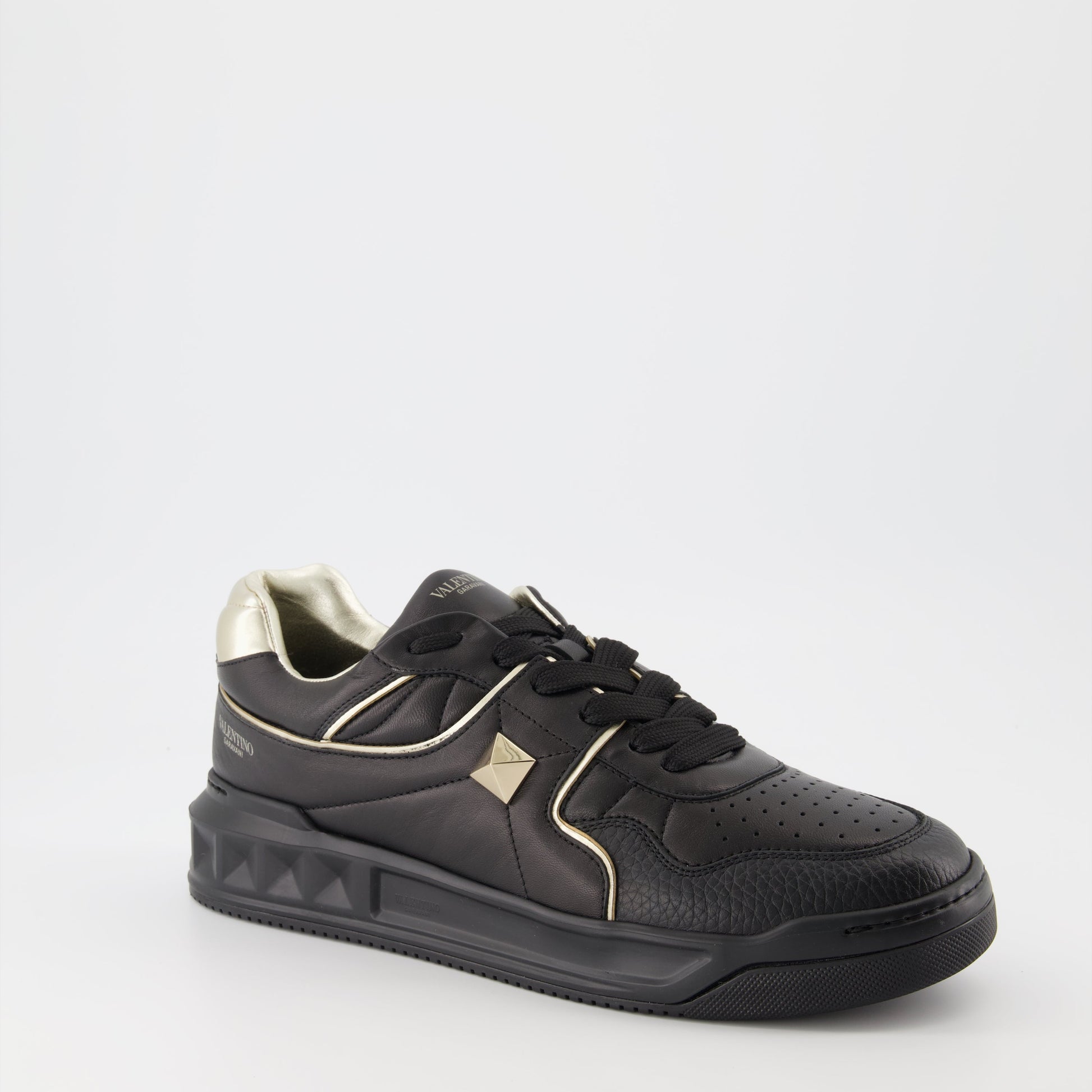 Valentino Garavani, luxury sneakers, men's fashion, designer footwear, black and gold sneakers