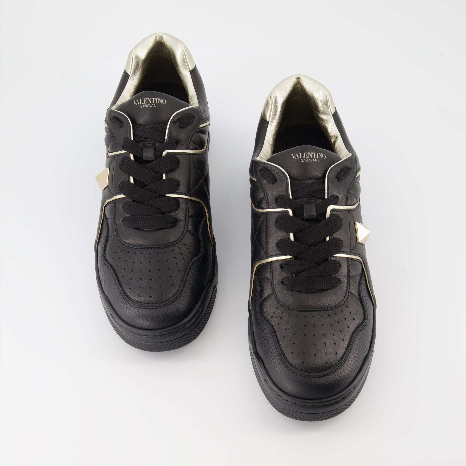 Valentino Garavani, luxury sneakers, men's fashion, designer footwear, black and gold sneakers