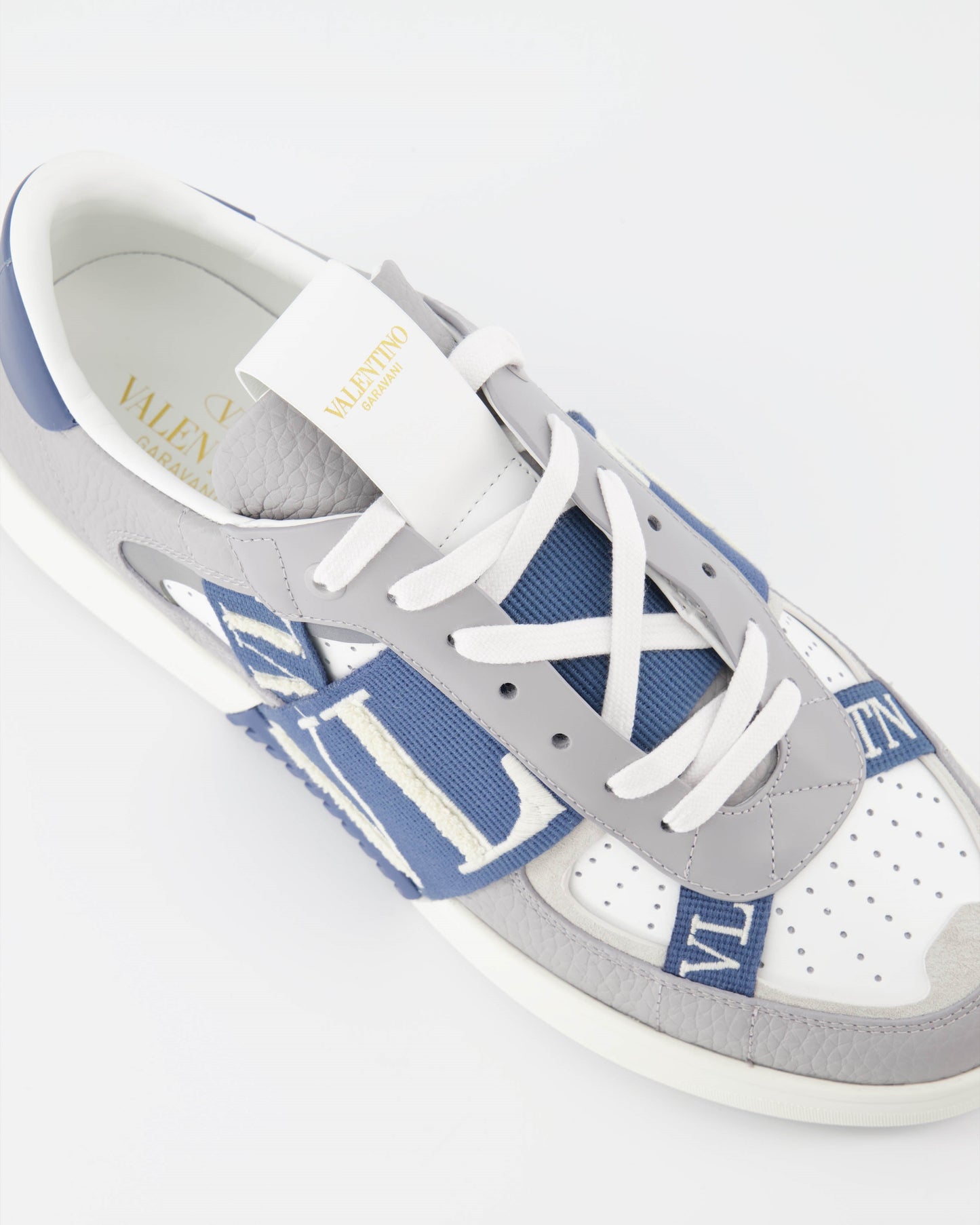 luxury sneakers, Valentino Garavani, grey-blue sneakers, high-end footwear, VL7N sneakers