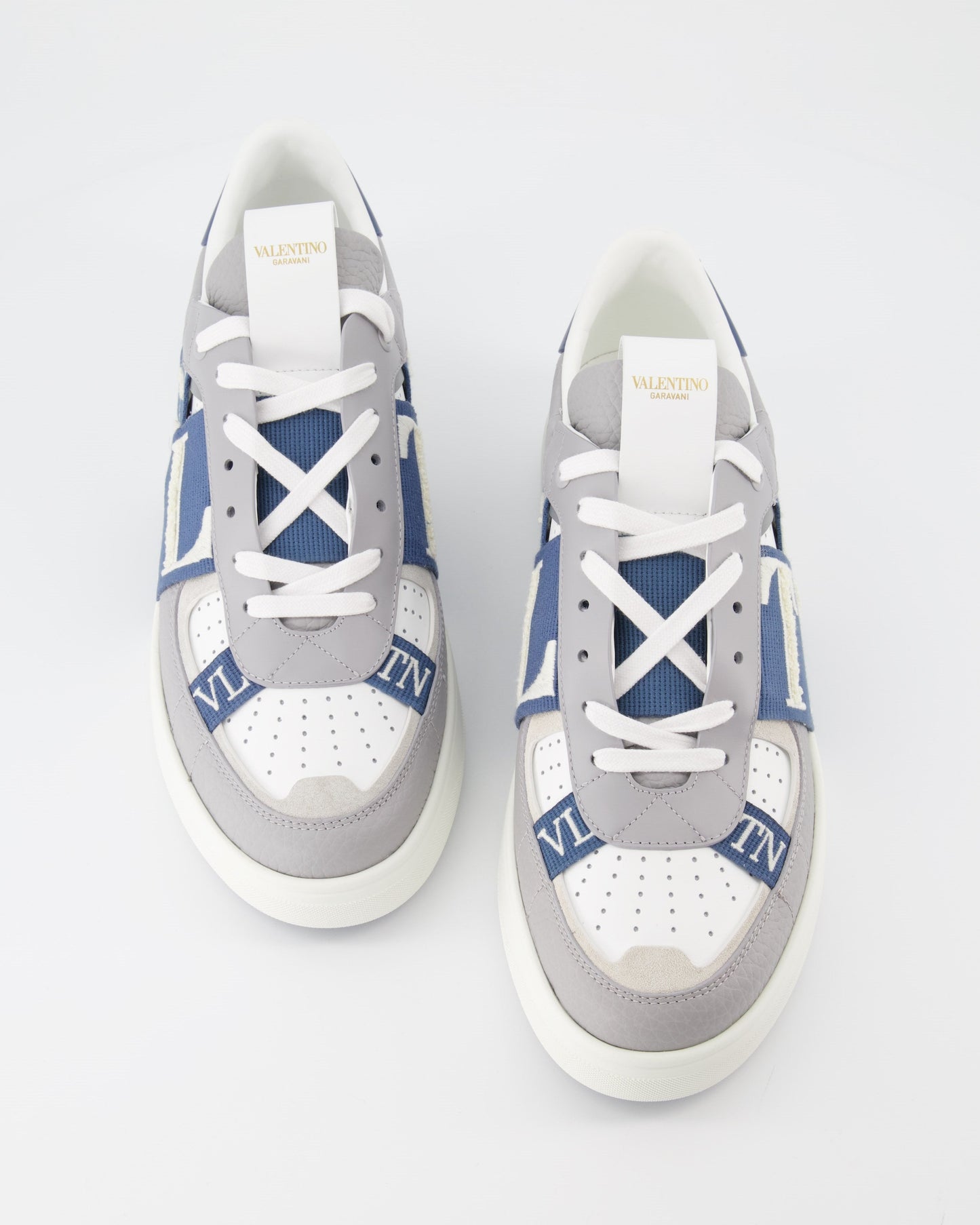 luxury sneakers, Valentino Garavani, grey-blue sneakers, high-end footwear, VL7N sneakers