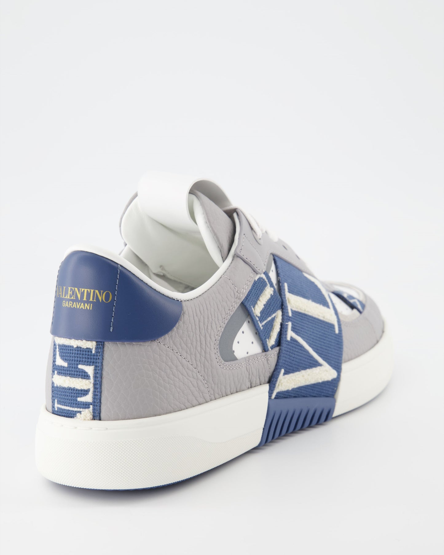 luxury sneakers, Valentino Garavani, grey-blue sneakers, high-end footwear, VL7N sneakers