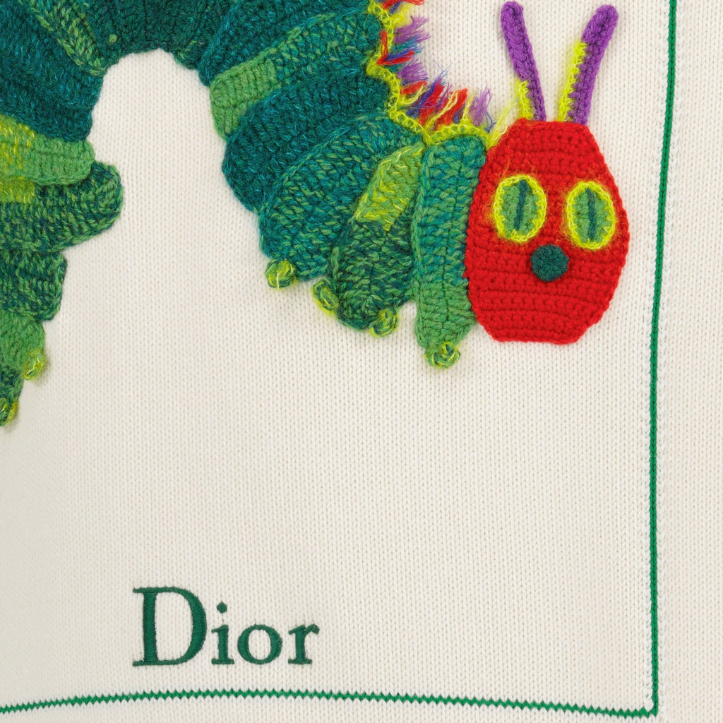 Pullover Blanc de Dior con copertina di libro