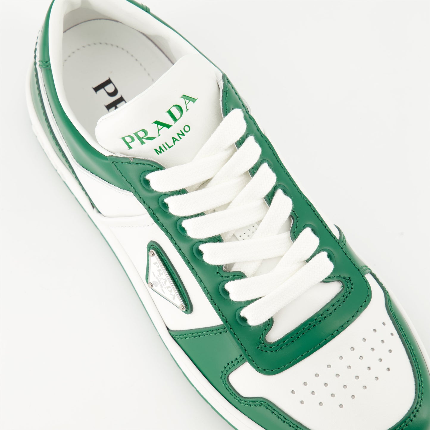 Prada sneakers, luxury sneakers, white and green leather sneakers, modern high-end footwear, Autumn-Winter 2024 collection