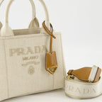 canvas tote bag, Prada, beige tote, luxury accessories, embroidered logo