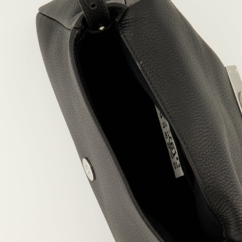 black leather handbag, Numeric Pouch, stylish accessory, designer leather bag, premium handbag