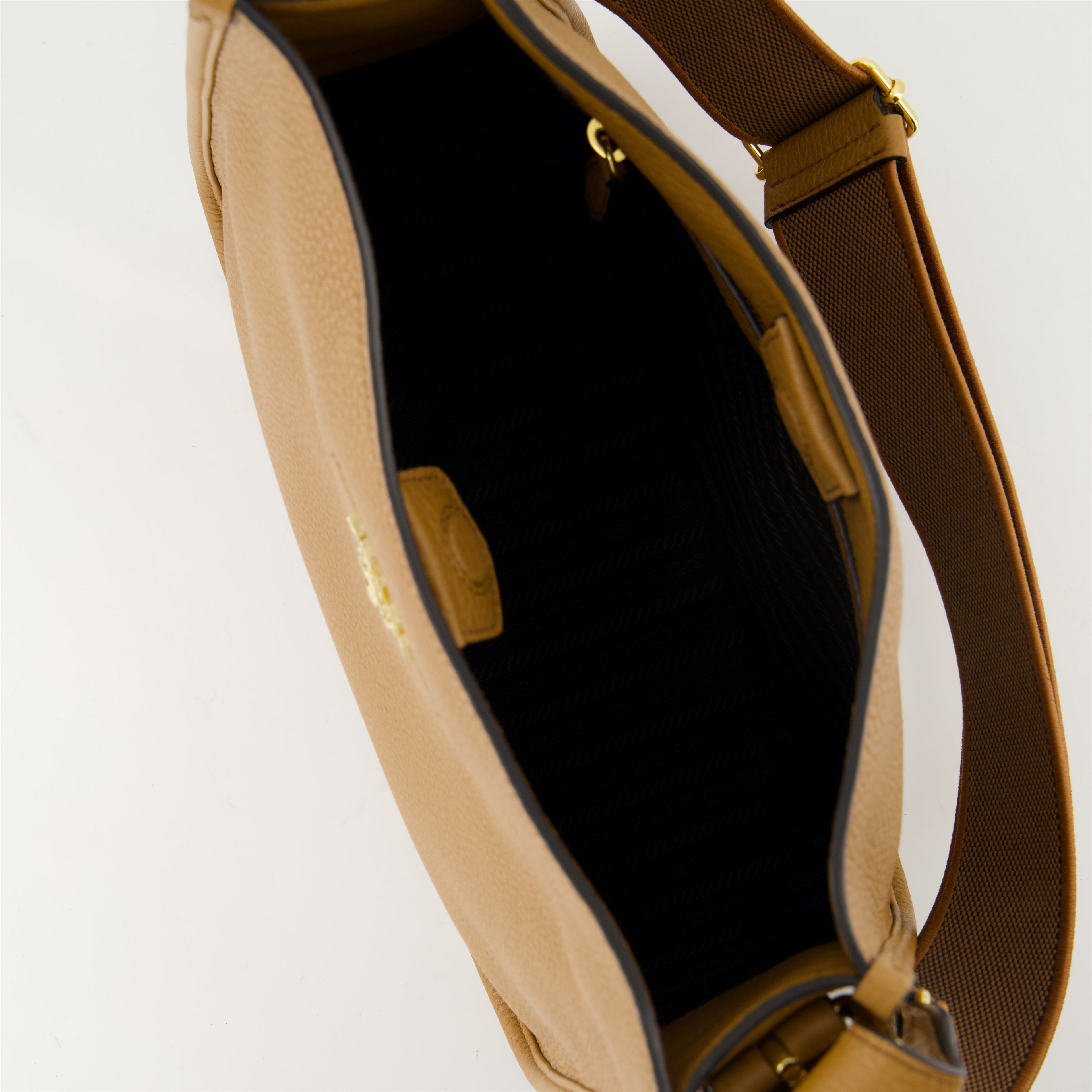 Prada hobo bag, camel leather bag, designer handbag, spring-summer collection, practical luxury accessories