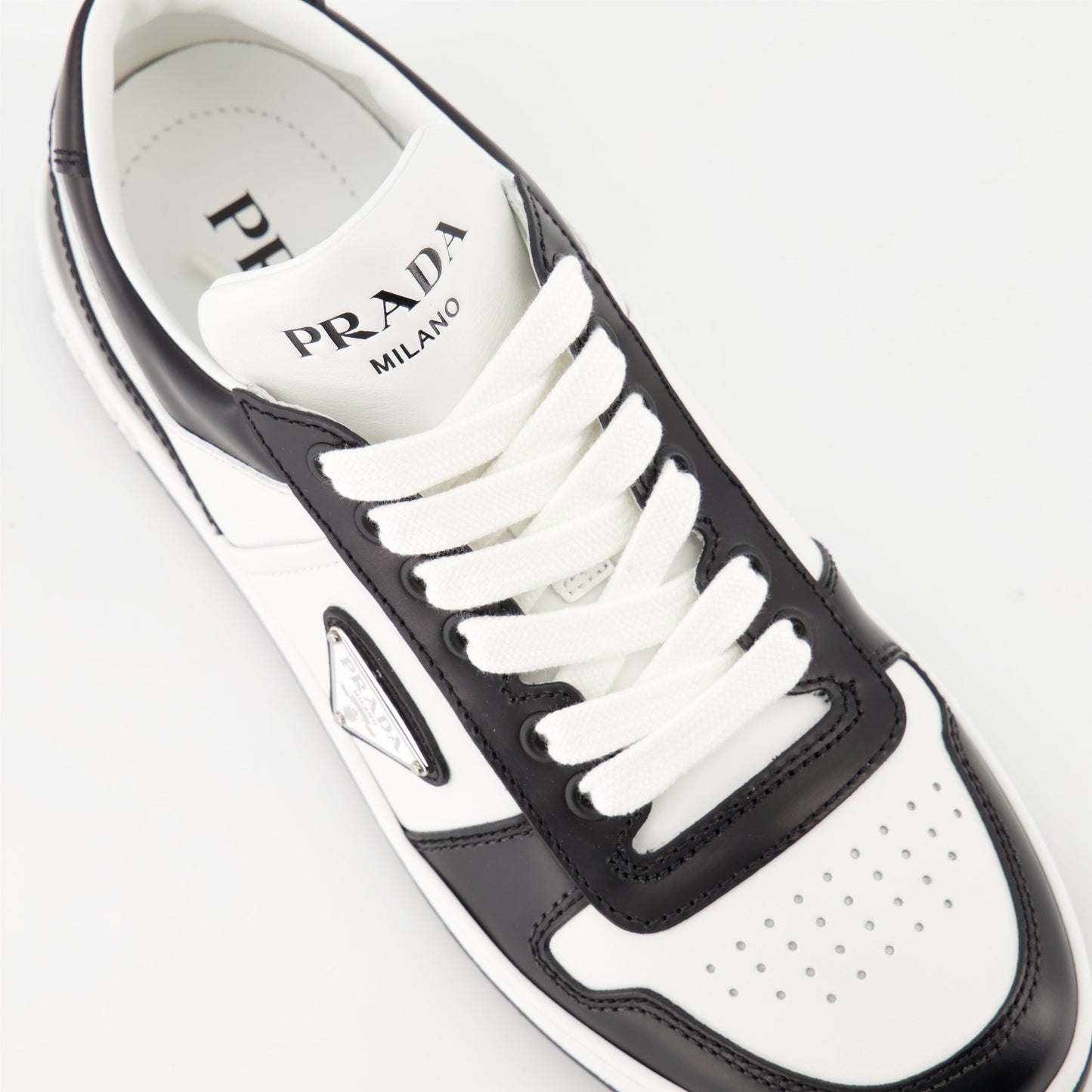 Prada sneakers, luxury footwear, black and white leather sneakers, Autumn-Winter 2024, high-end sneakers