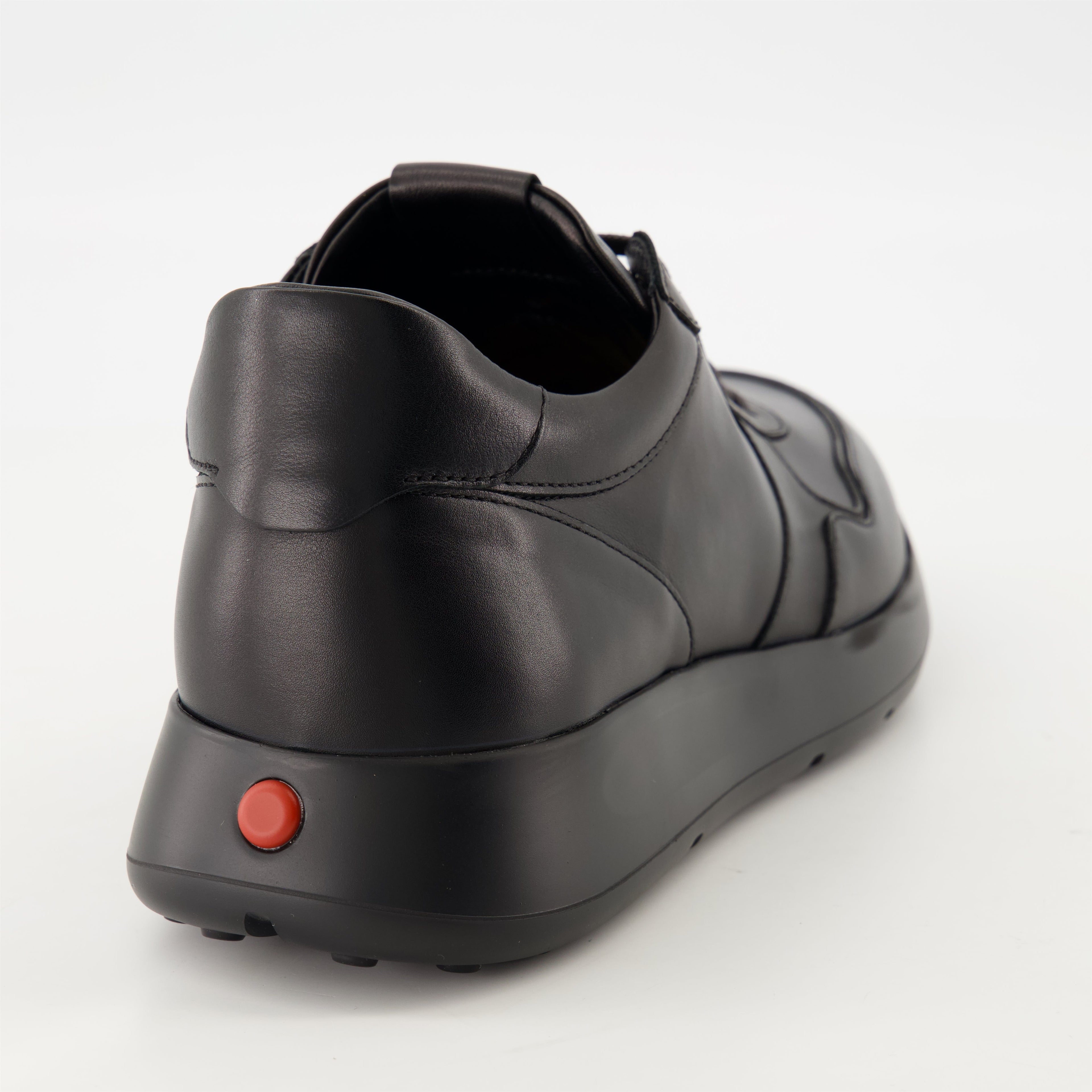 black sneakers, Tod's shoes, leather footwear, stylish sneakers, casual elegance