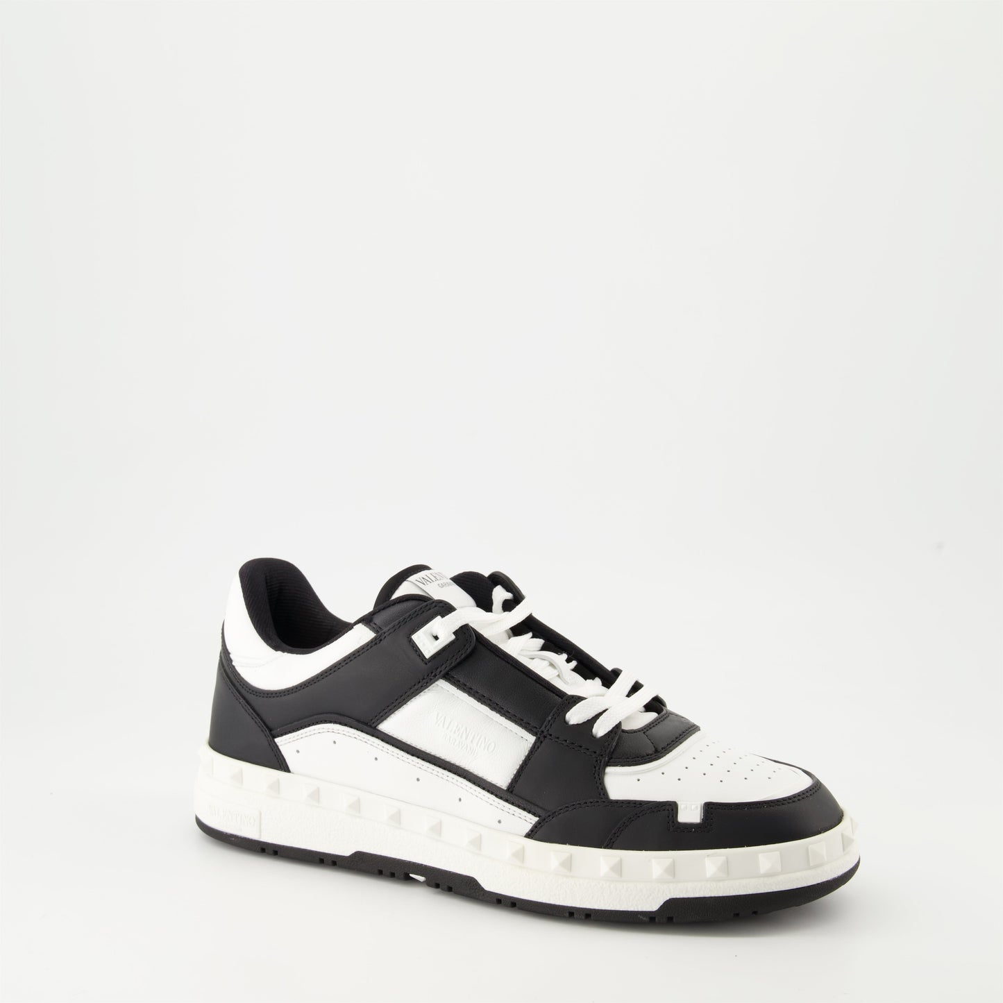 Valentino Garavani sneakers, black and white leather sneakers, luxury footwear, designer sneakers, high-end fashion