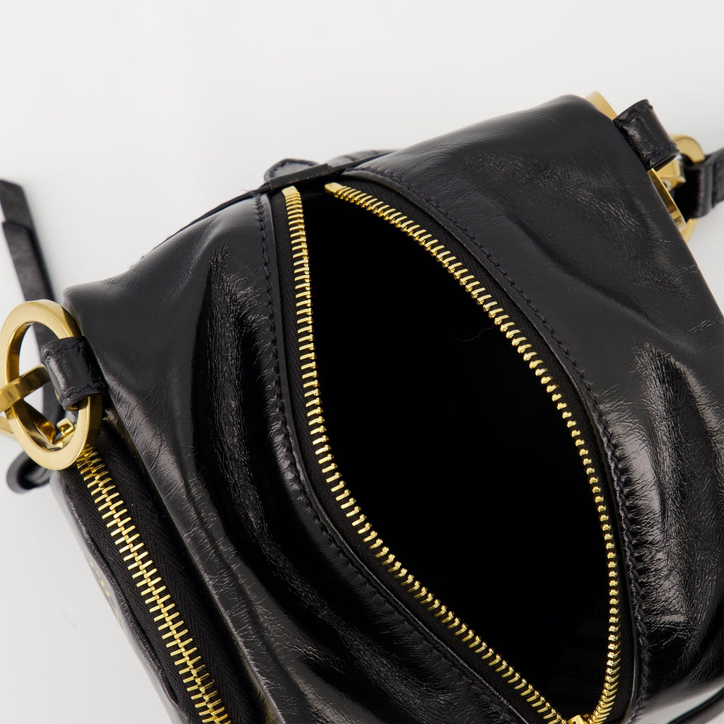 black leather bag, Prada mini bag, vintage leather accessory, zip closure handbag, stylish women's bag