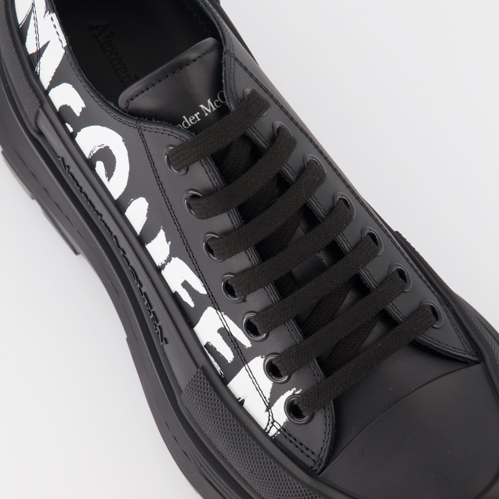 Alexander McQueen, Tread Slick, men's luxury sneakers, black low-top sneakers, designer footwear