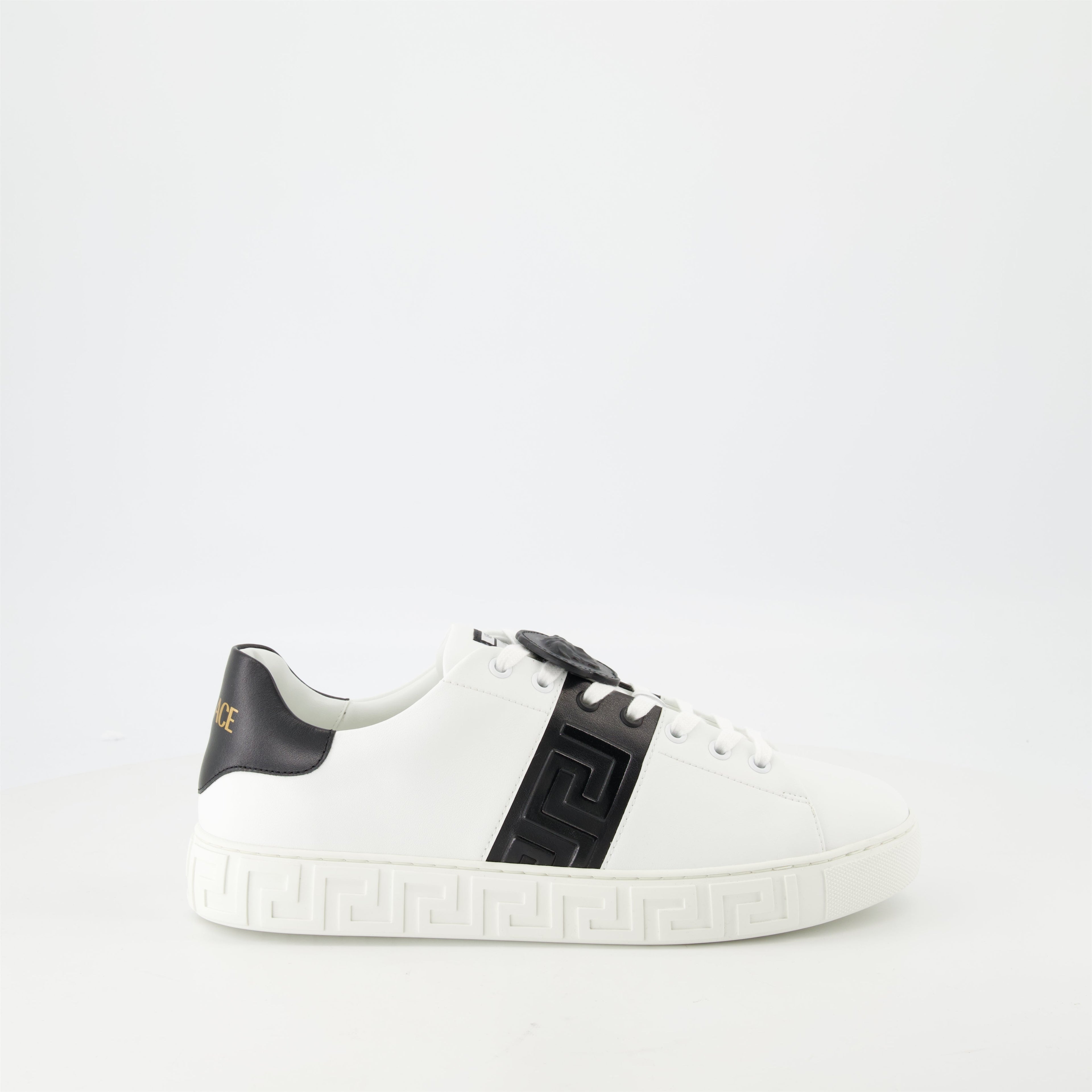Versace sneakers, Greca design, black and white sneakers, smooth leather footwear, luxury casual shoes
