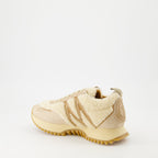 - Shearling sneakers- Moncler AW 2024- Luxury footwear- Beige suede sneakers- High-end casual shoes