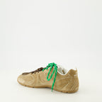 Image of New Balance x Miu Miu 530 SL Sneakers by Miu Miu for Women - Season Spring-Summer 2026 - Back Right Three-Quarter View